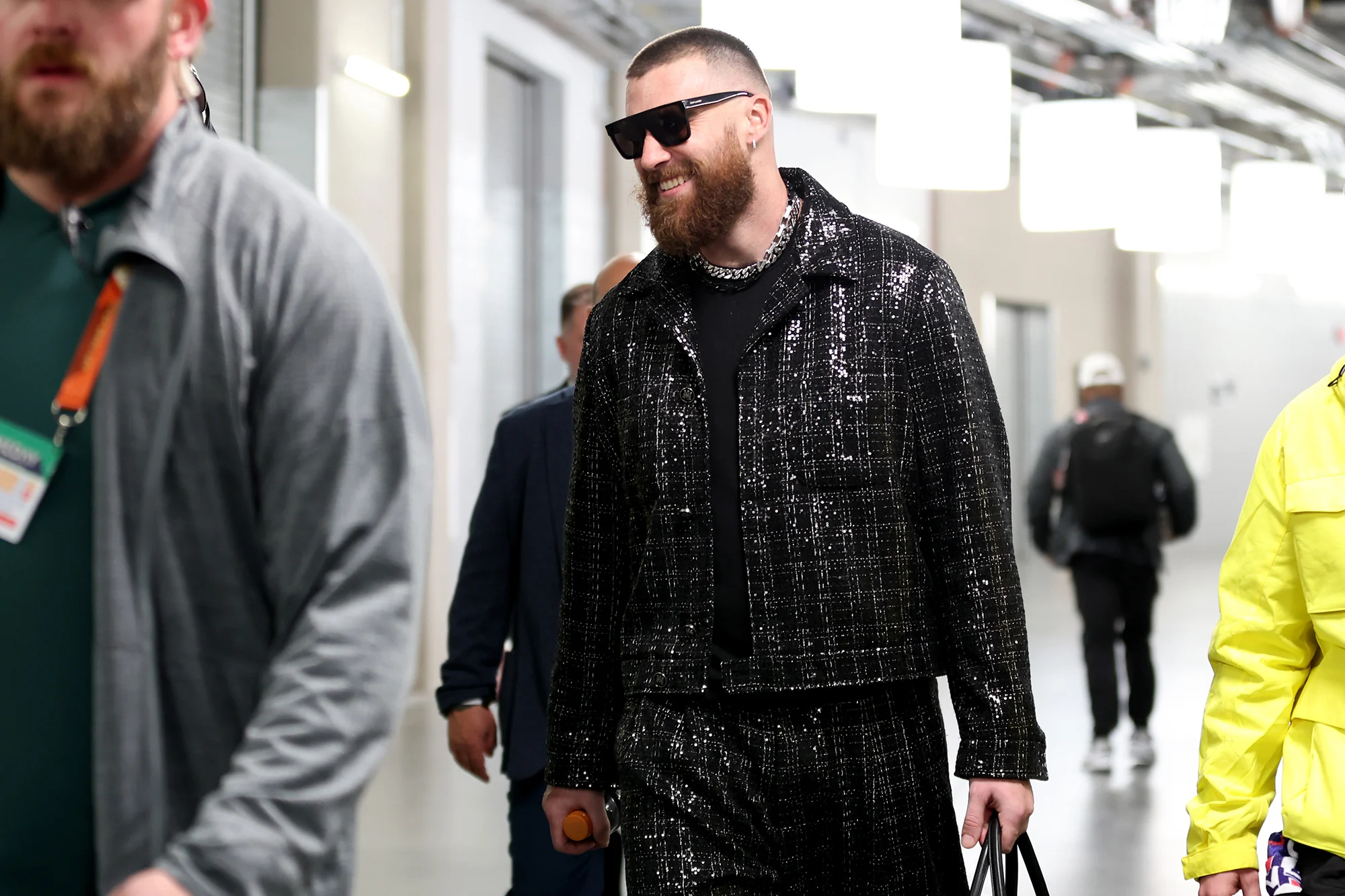 Taylor Swift and Travis Kelce Diverge in Super Bowl Fashion Statements"